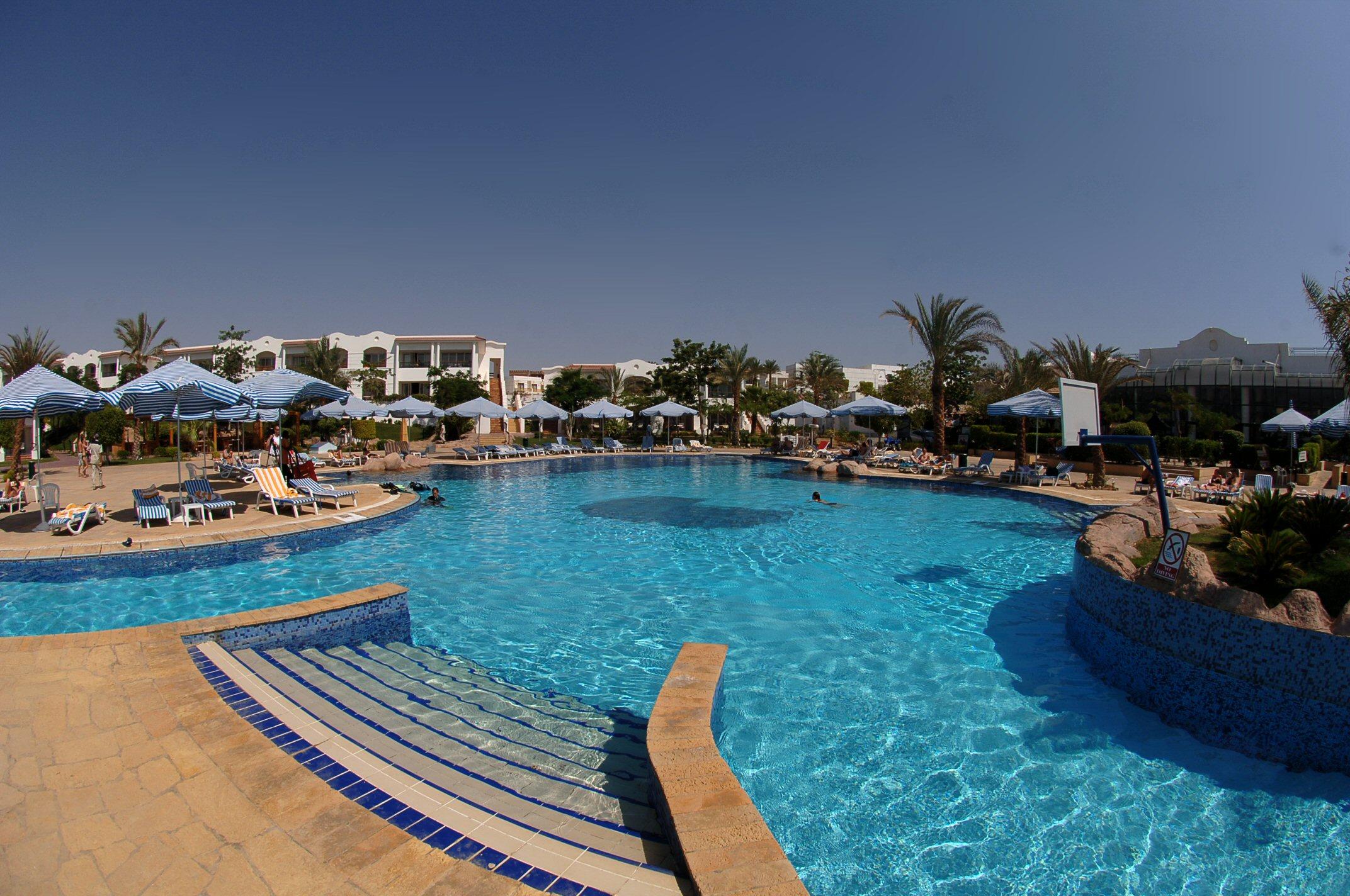 Hotel Jaz Sharm Dreams Exterior foto A swimming pool at a resort in Egypt